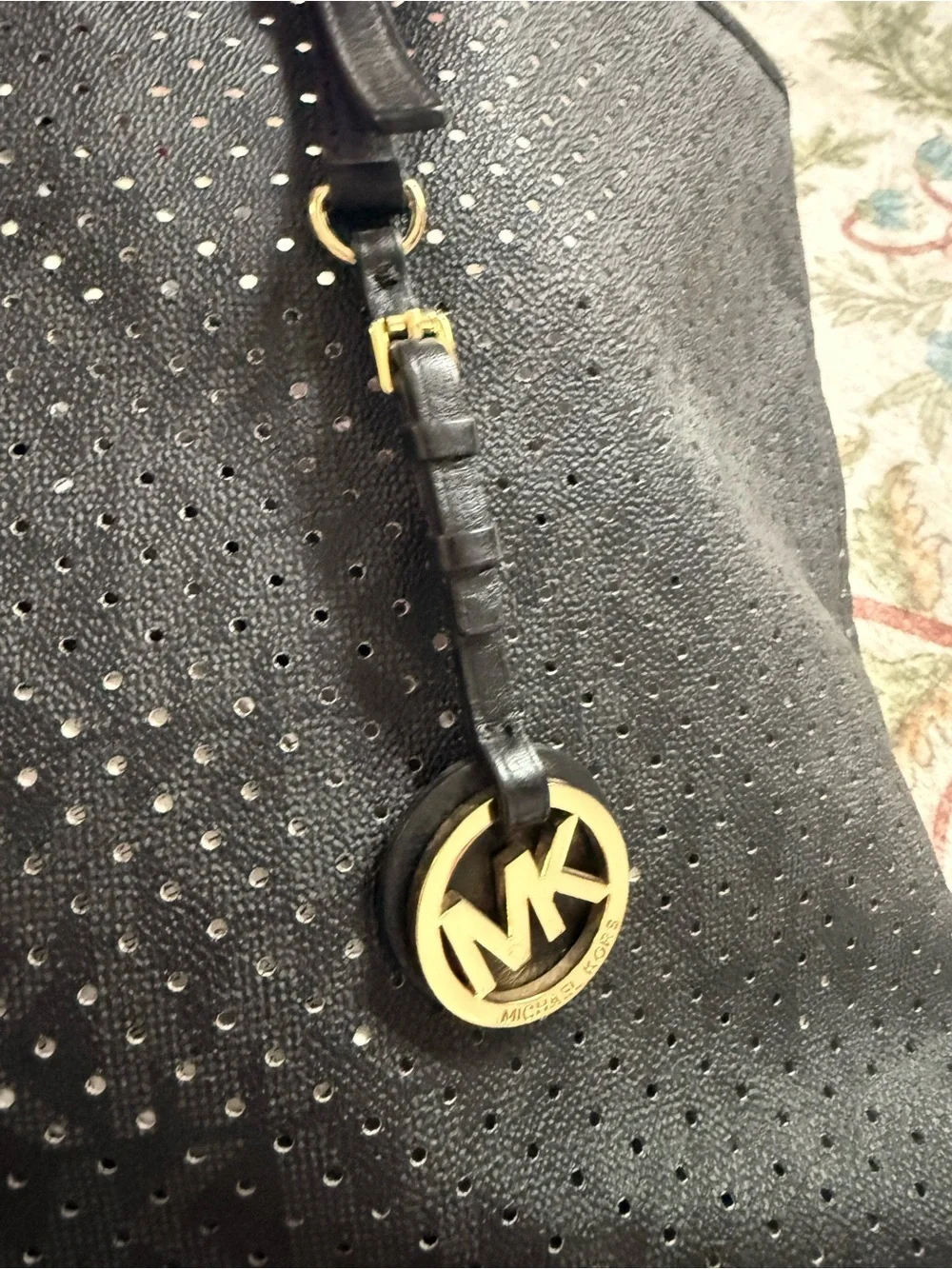 Michael Kors Black Perforated Tote with Gold Logo Charm